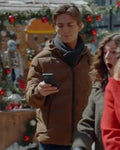 A Make or Break Holiday Evan Roderick Brown Puffer Jacket