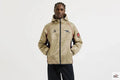 Veste coupe-vent rétro dorée d’Arsenal Clanton Jacket